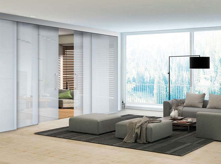 Multi-slide telescopic doors opening to a garden view