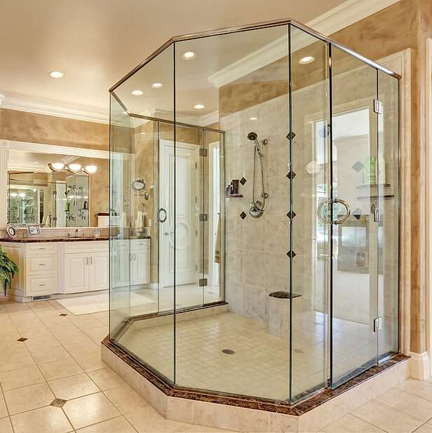 Enhance privacy and style with a custom frosted shower glass partition.
