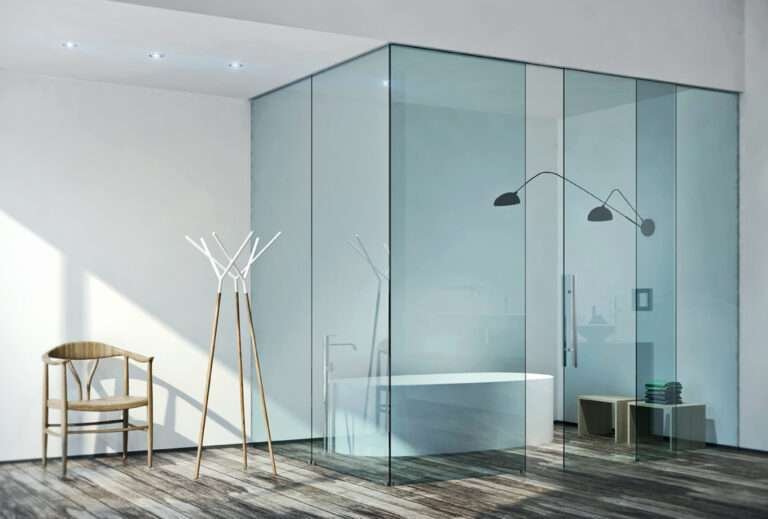 Sliding shower glass door maximizing small bathroom space