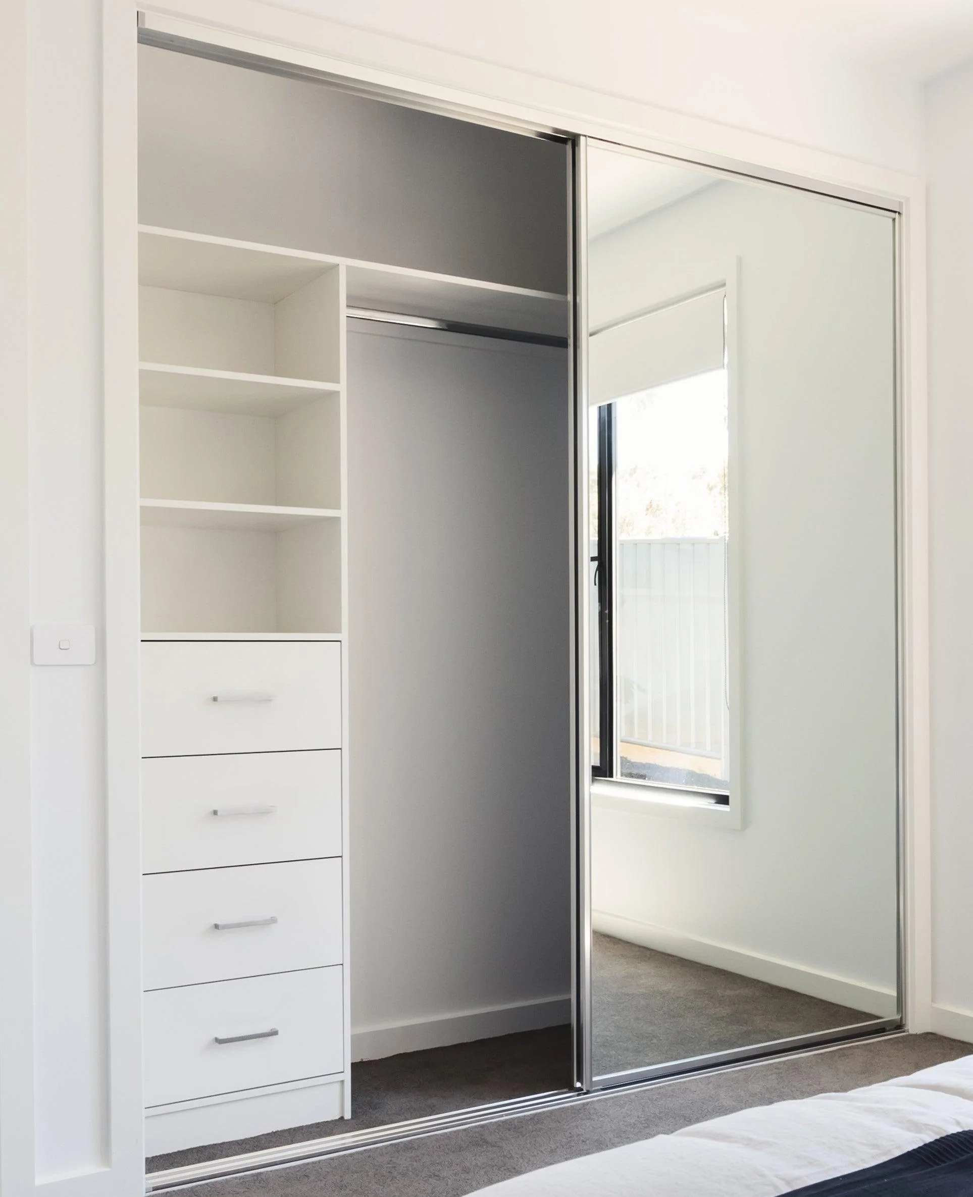 Upgrade your wardrobe with space-saving sliding cupboard doors in custom finishes.