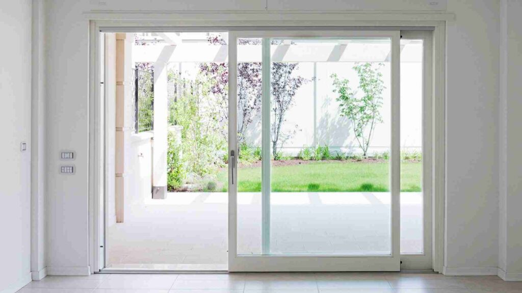 A clean PVC sliding door installed in a modern interior, showing a lightweight, moisture-resistant and smooth-gliding design.