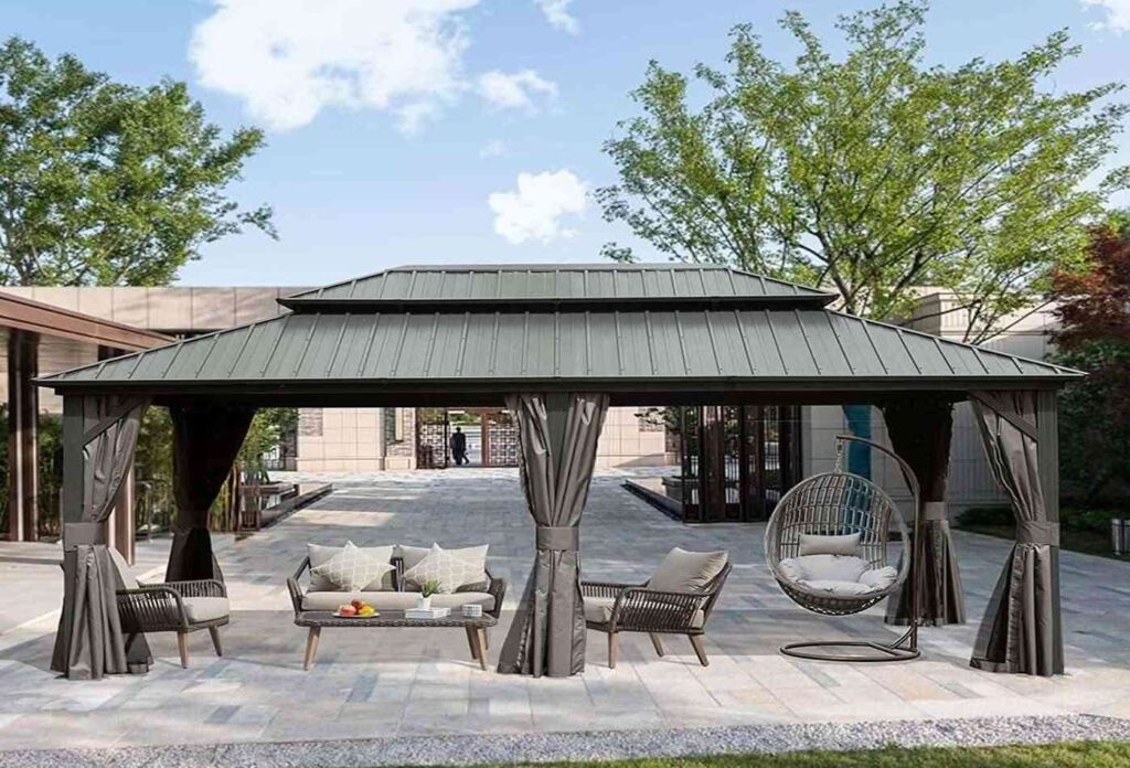 Metal gazebo installed in a modern garden, providing shade and stylish outdoor seating.