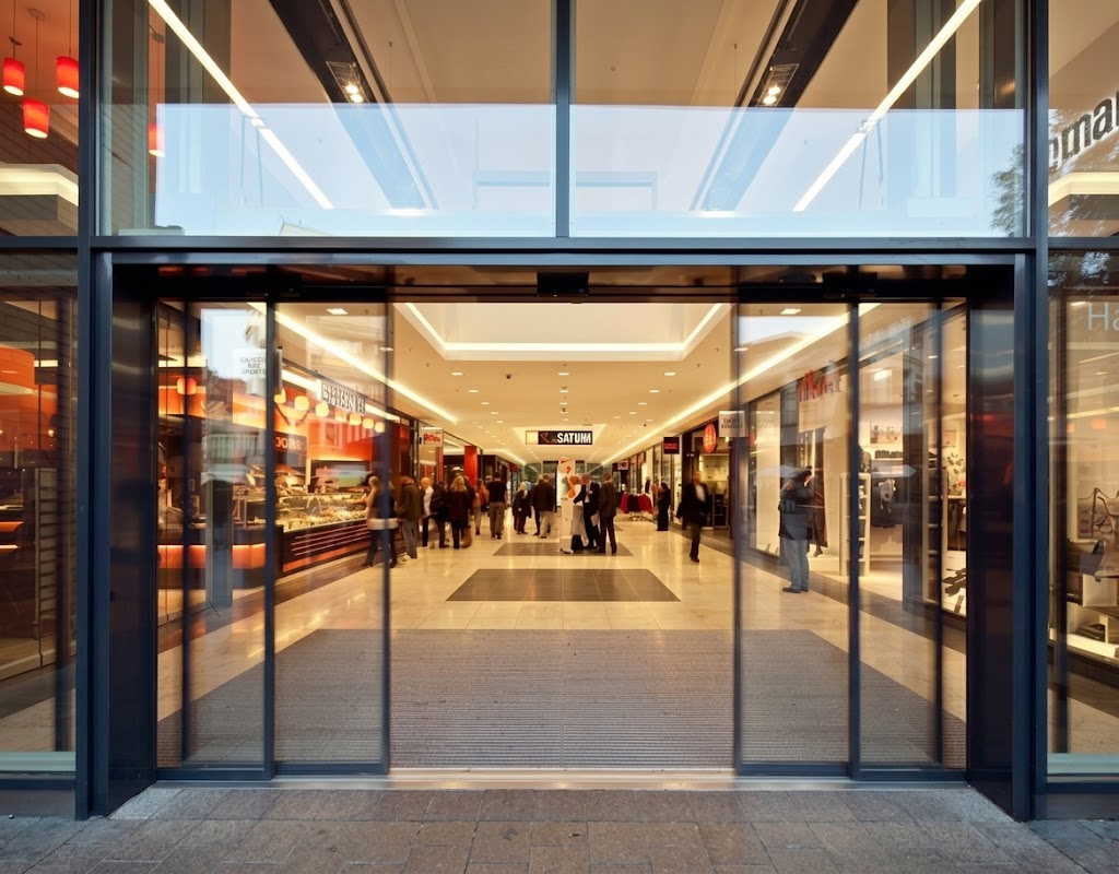 Automatic sliding glass storefront door system in Dubai Mall retail boutique
