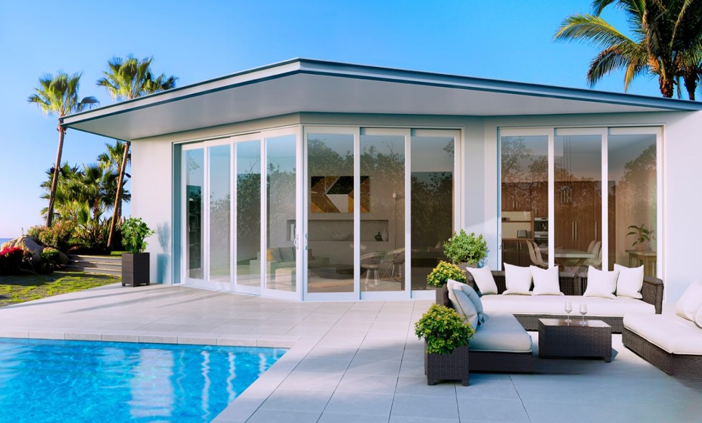 DreamFold professional door installation process showing certified technicians installing bifold doors in Dubai villa