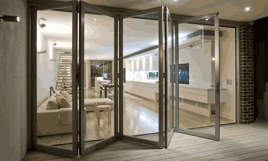 Dubai door showroom displaying various door types including bifold sliding pivot and French doors with different materials