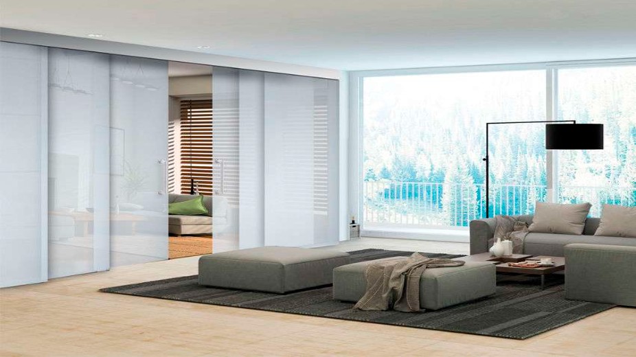 Professional multi-slide telescopic installation showing multi-track mounting and panel synchronization in Dubai property
