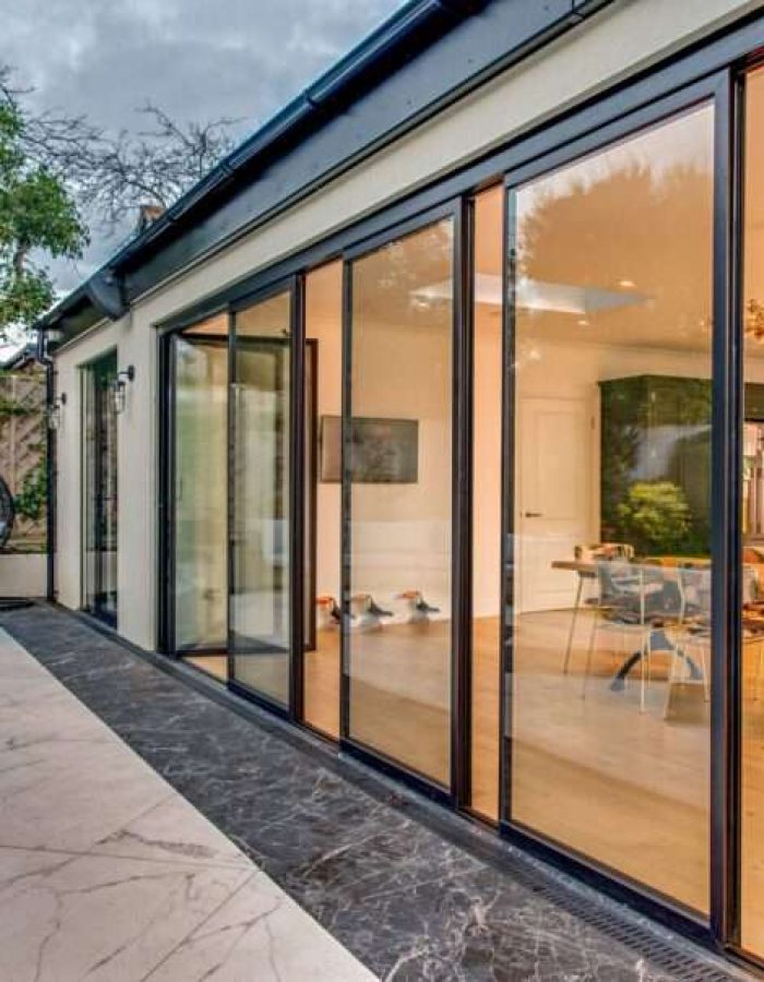 Create an elegant, open-plan living space with ultra slim bi-fold doors, designed for smooth operation and sleek aesthetics.